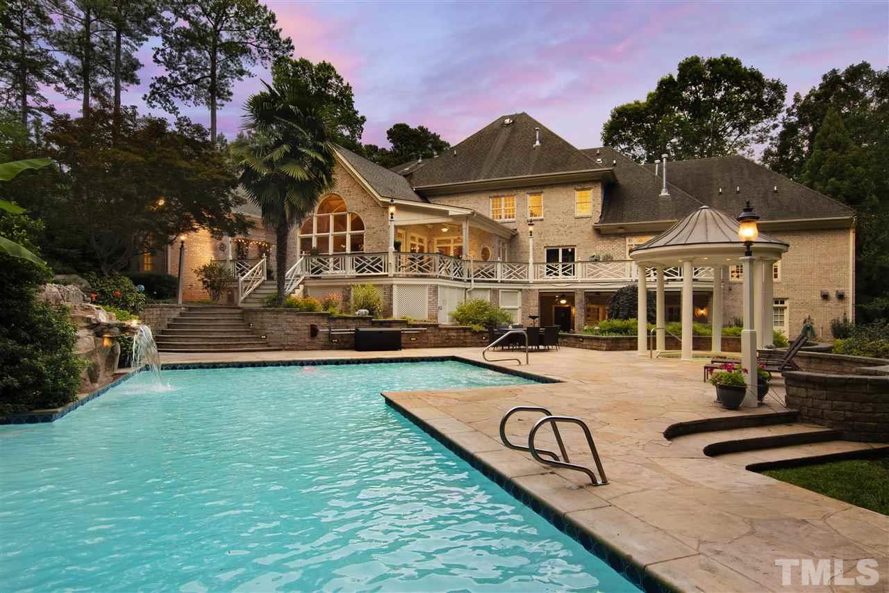 8423 Bournemouth Drive Raleigh, NC 27615 - Photo 28 of 30 a view of a house with swimming pool and sitting area