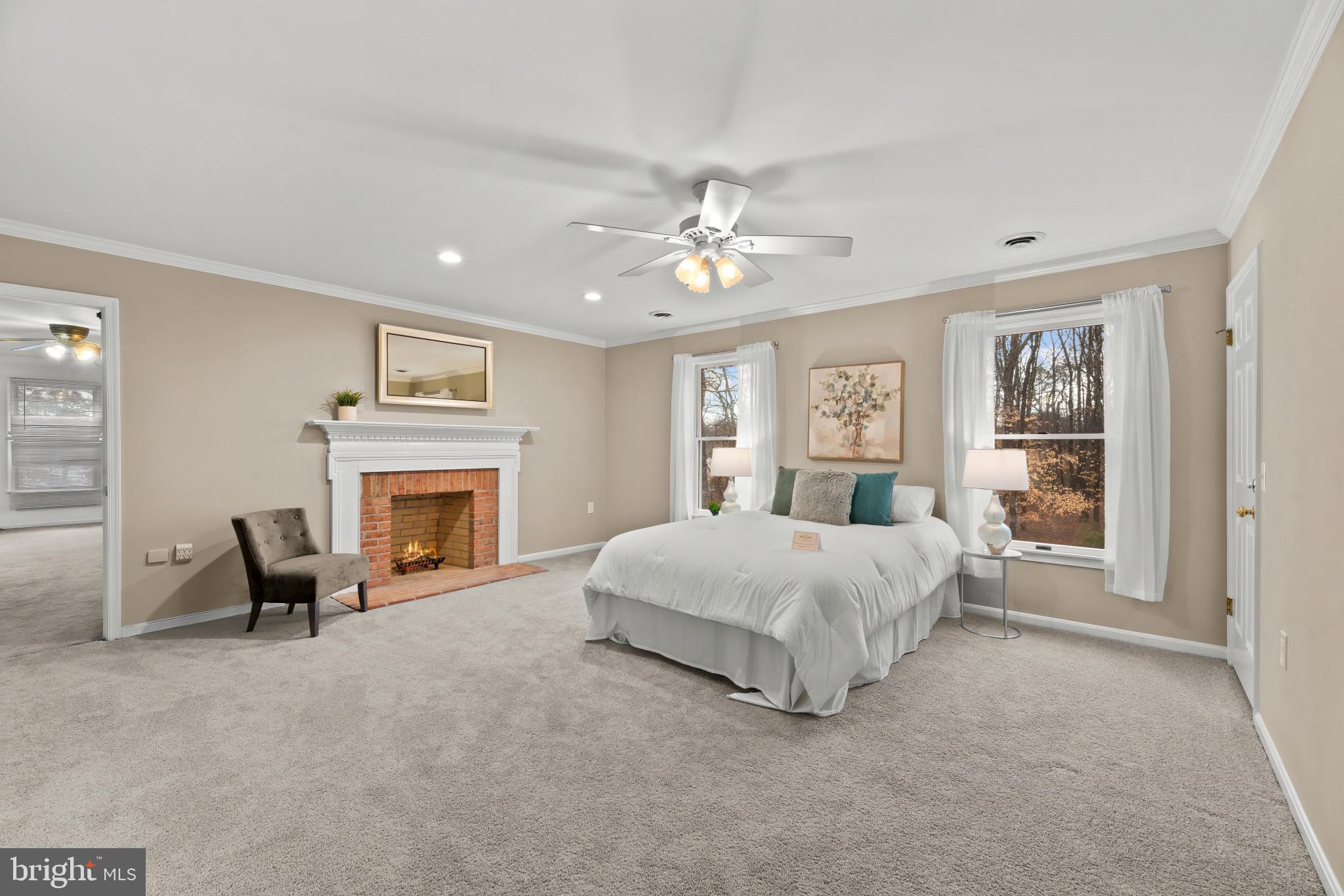 2107 Bennett Point Road Queenstown, MD 21658 - Photo 17 of 38 Primary Bedroom with wood burning fireplace!