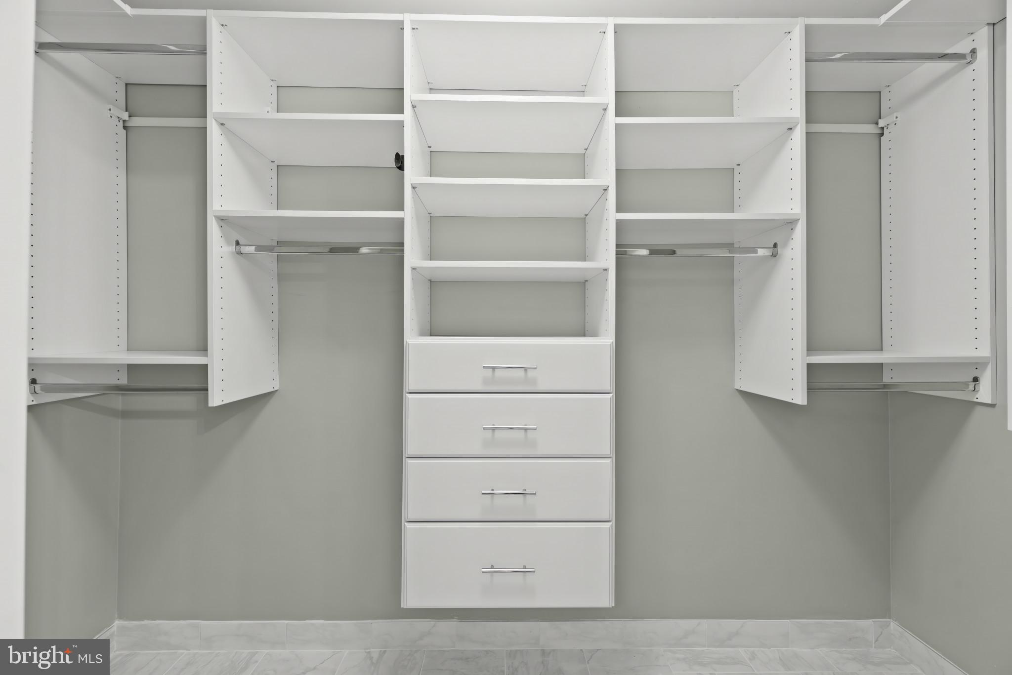 2107 Bennett Point Road Queenstown, MD 21658 - Photo 21 of 38 Primary Walk-In Closet with Laundry chute