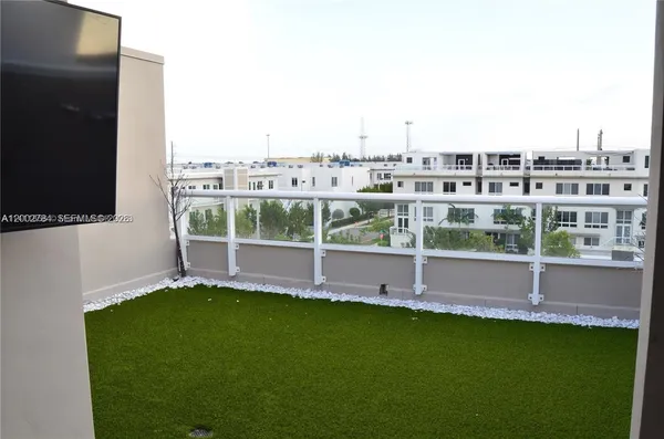 a view of building with river in outdoor space