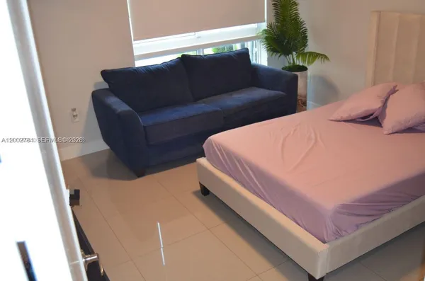 a small room with wooden floor
