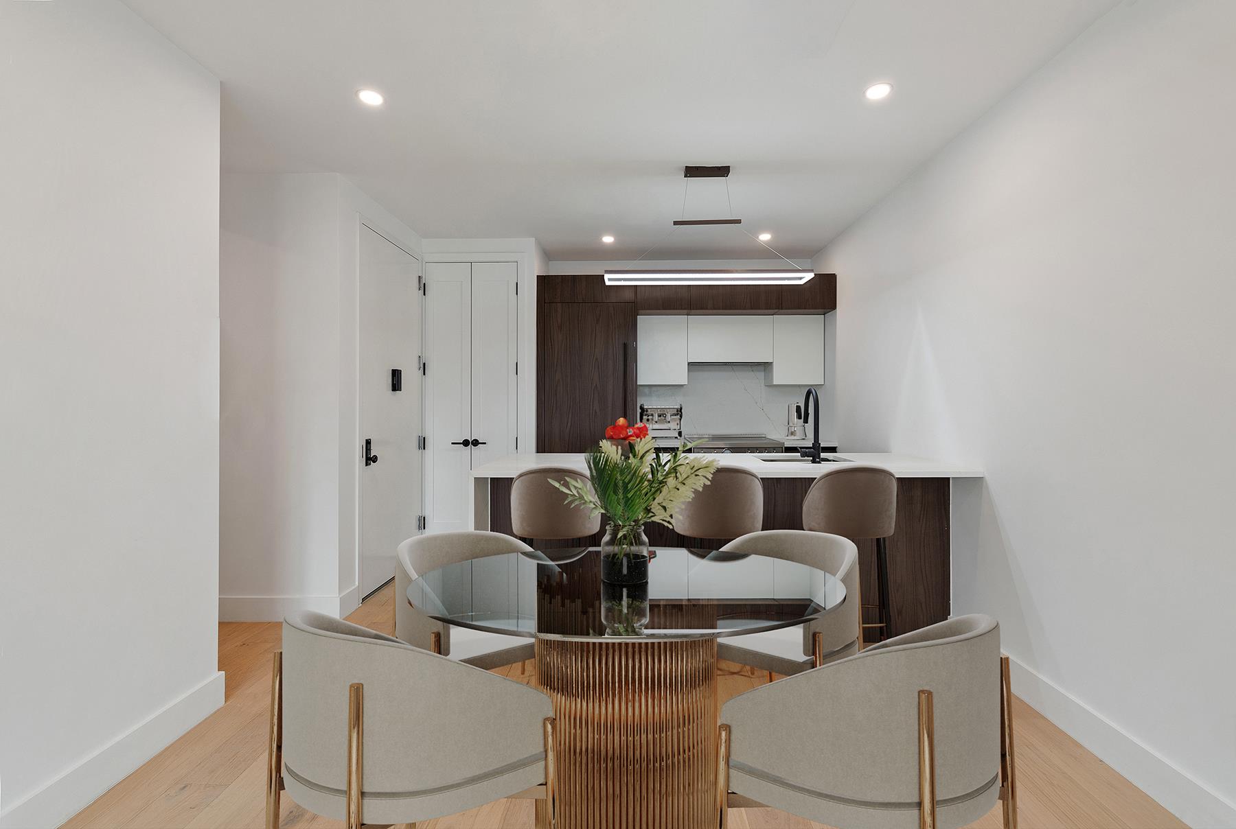 62 Veronica Place, Unit 2A Brooklyn, NY 11226 - Photo 2 of 7 a view of kitchen with dining area