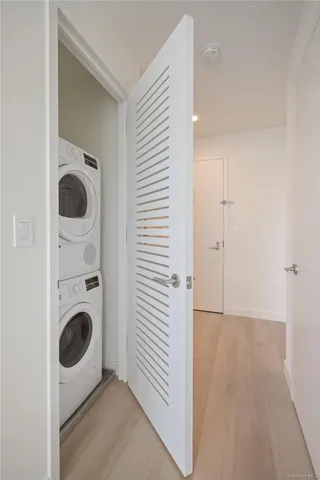 a view of a patio with couches and potted plants