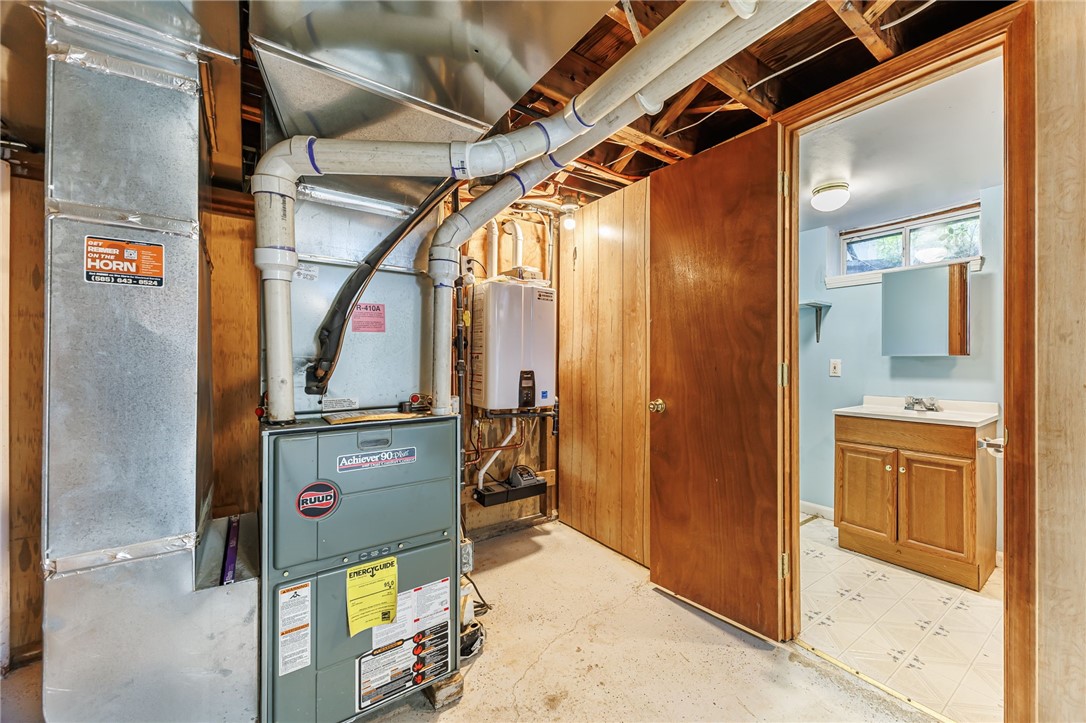 53 Guildhall Road Rochester, NY 14623 - Photo 27 of 35 High efficiency furnace and new on-demand tank less hot water heater,