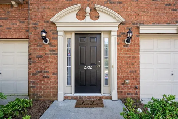 a front view of a house with a door