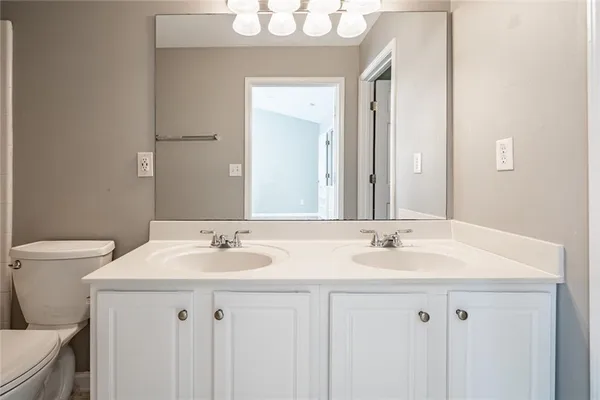 a bathroom with a sink and a toilet