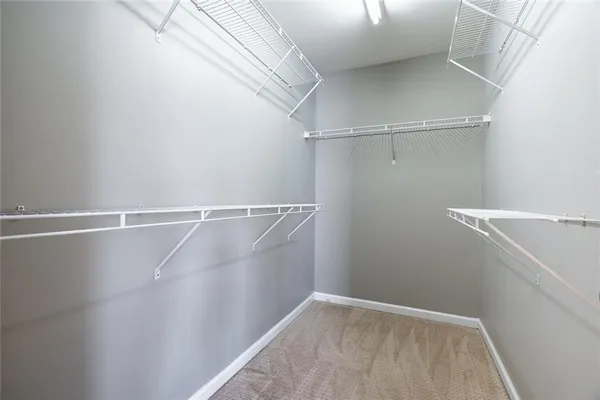 a view of an empty walk in closet