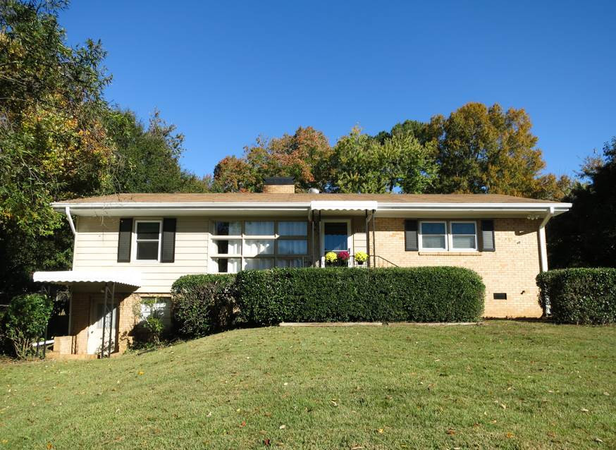 105 Dartmouth Road Raleigh, NC 27609 - Photo 1 of 25 UPDATED 3BR/2BA/1821sf Midtown ranch in Farrior Hills w/unfinished basement storage! Near I-440; WALK TO NORTH HILLS SHOPS/DINING! On .47 ac wooded lot w/detached 2-car Garage in backyard surrounded by tall trees. Exterior Front