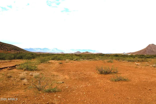 a view of lake with mountain