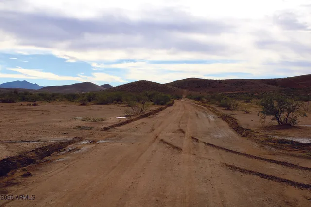 a view of mountain with ocean view