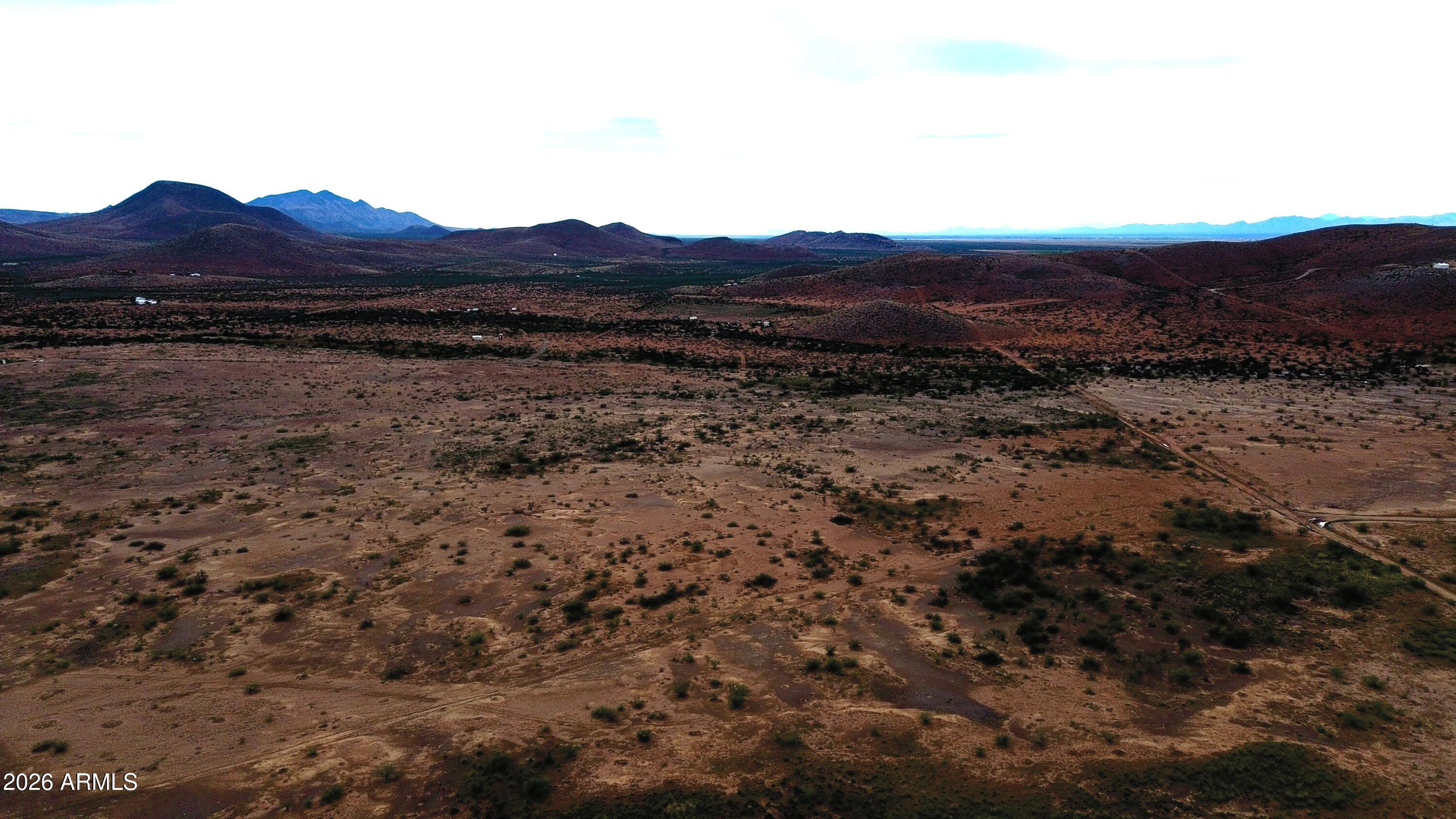 5-acres North Morgan Road, Unit E Pearce, AZ 85625 - Photo 9 of 21 a view of a large mountain with a mountain in the background