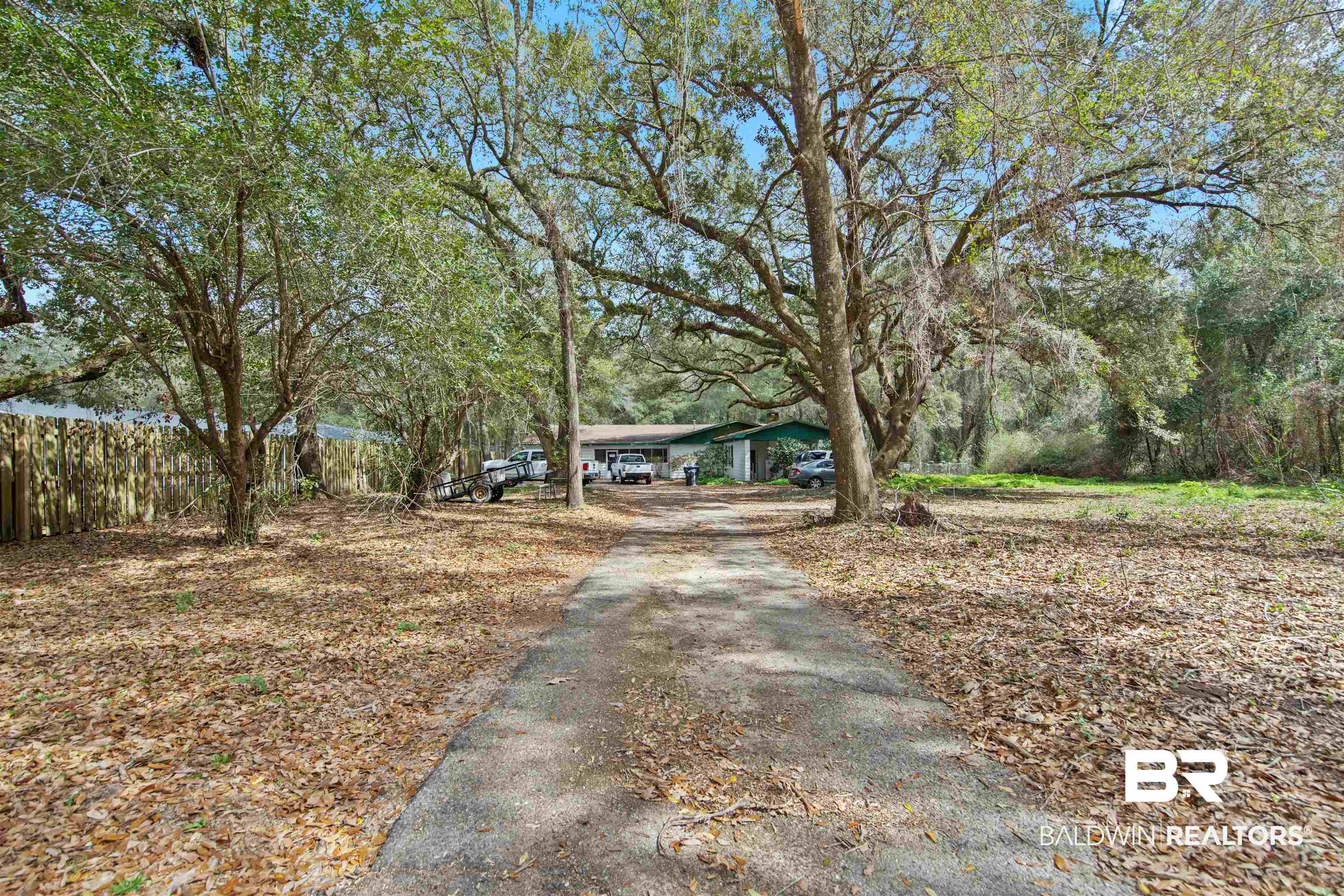 2671 Dawes Road Mobile, AL 36695 - Photo 9 of 11 View of front of house with asphalt driveway