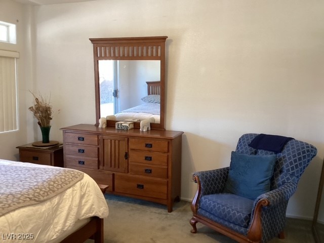 3343 Quail Song Drive Laughlin, NV 89029 - Photo 14 of 22 Carpeted bedroom featuring multiple windows