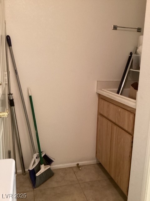 3343 Quail Song Drive Laughlin, NV 89029 - Photo 17 of 22 Laundry room with light tile patterned flooring an