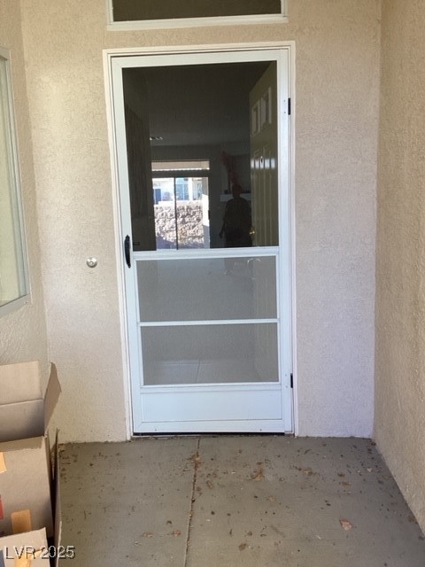 3343 Quail Song Drive Laughlin, NV 89029 - Photo 3 of 22 Doorway to property with stucco siding