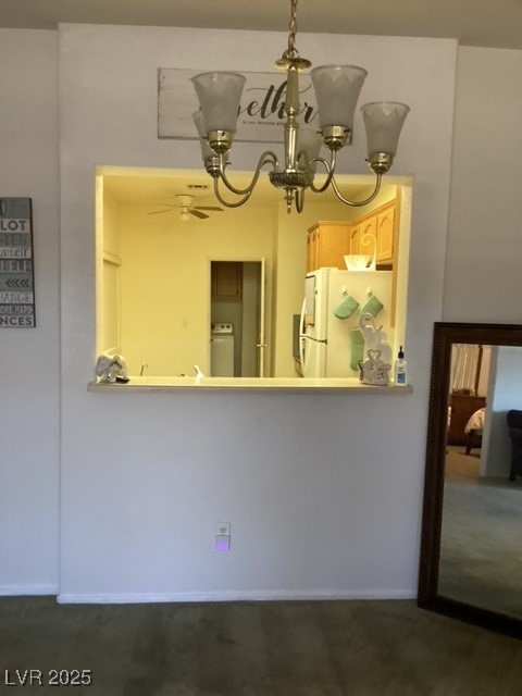 3343 Quail Song Drive Laughlin, NV 89029 - Photo 9 of 22 Unfurnished dining area with a chandelier and dark