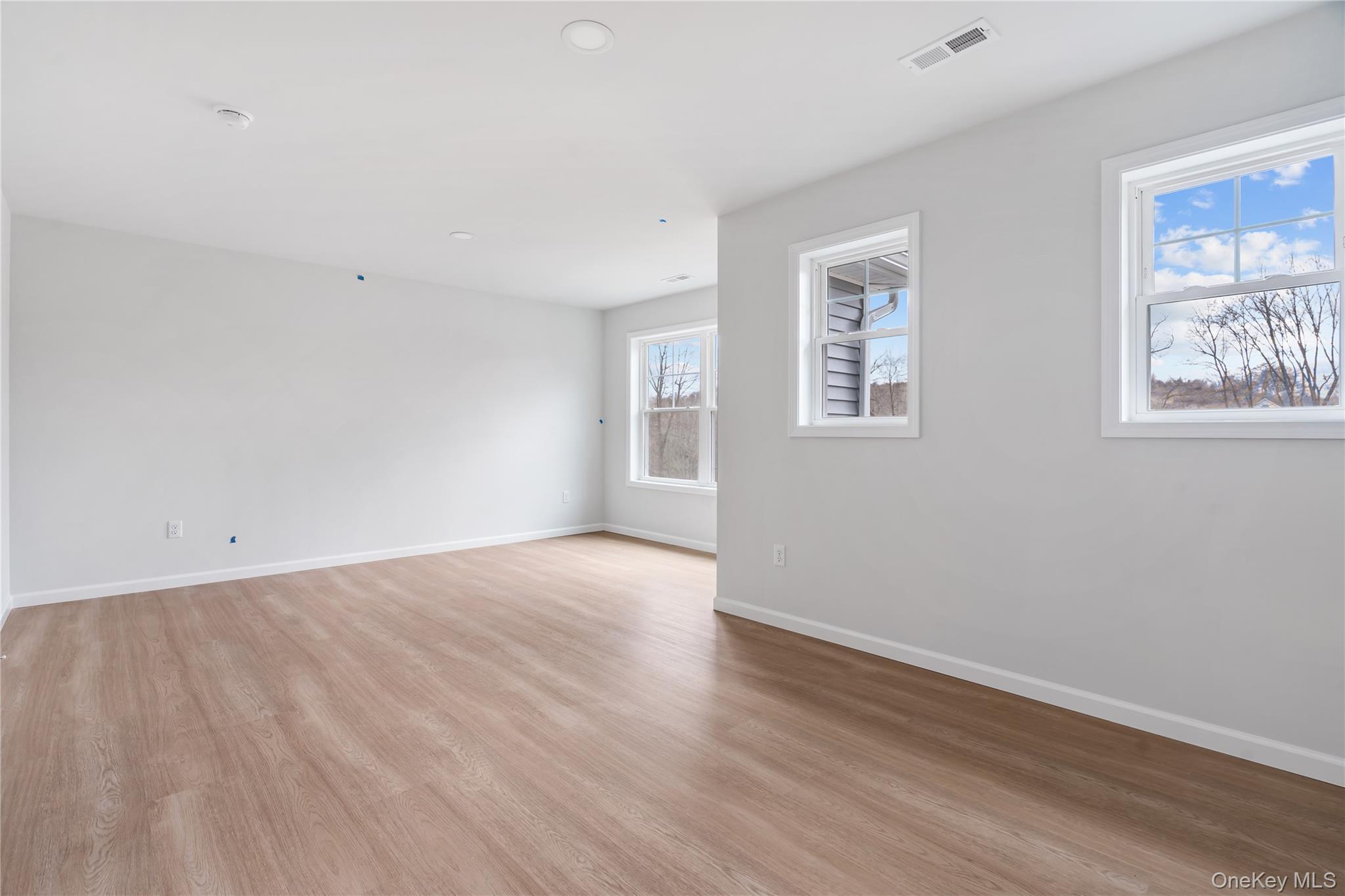 346 Old Hopewell Road Wappingers Falls, NY 12590 - Photo 32 of 42 a view of an empty room with wooden floor and window