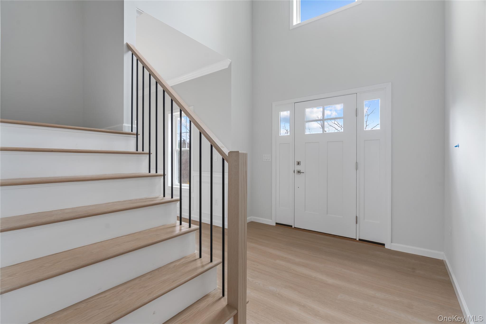 346 Old Hopewell Road Wappingers Falls, NY 12590 - Photo 4 of 42 a view of a hallway with wooden floor and entryway