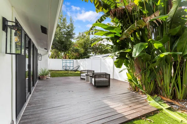 a view of outdoor space with garden and seating area