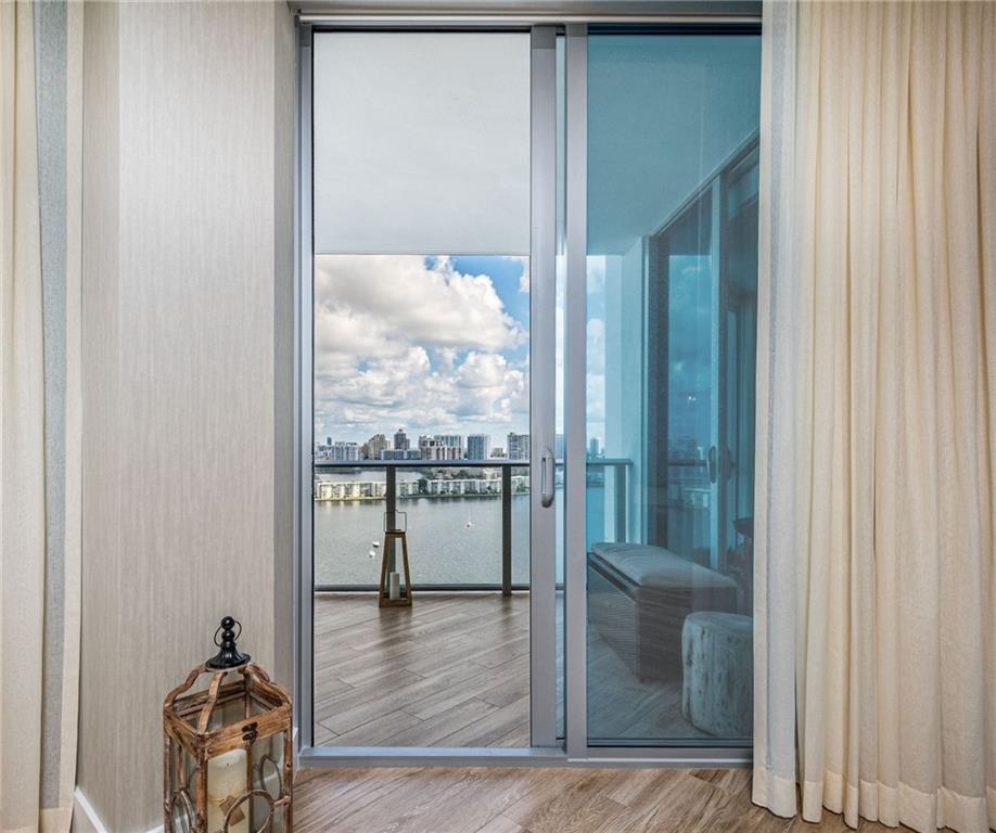 17111 Biscayne Boulevard North Miami Beach, FL 33160 - Photo 12 of 37 a view of a floor to ceiling window and wooden floor