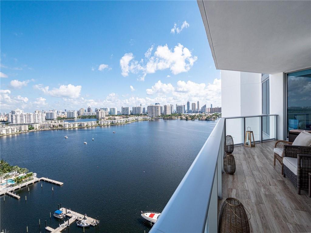 17111 Biscayne Boulevard North Miami Beach, FL 33160 - Photo 14 of 37 a view of a balcony with chairs