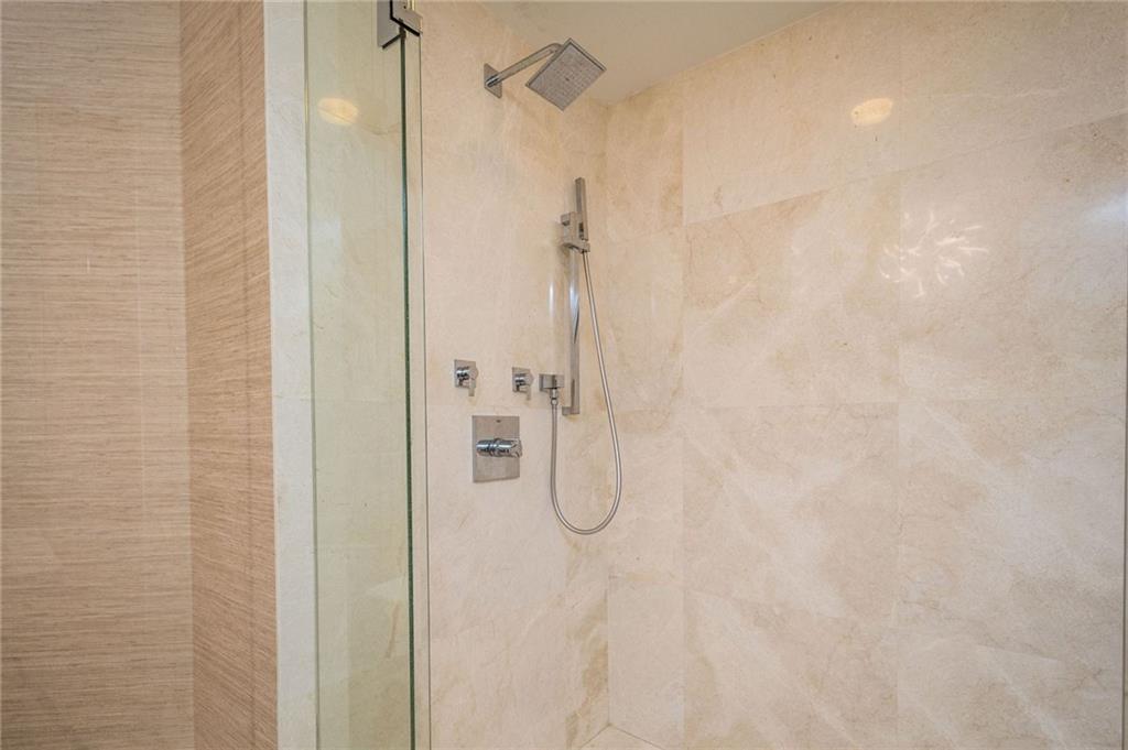 17111 Biscayne Boulevard North Miami Beach, FL 33160 - Photo 30 of 37 a bathroom with a shower
