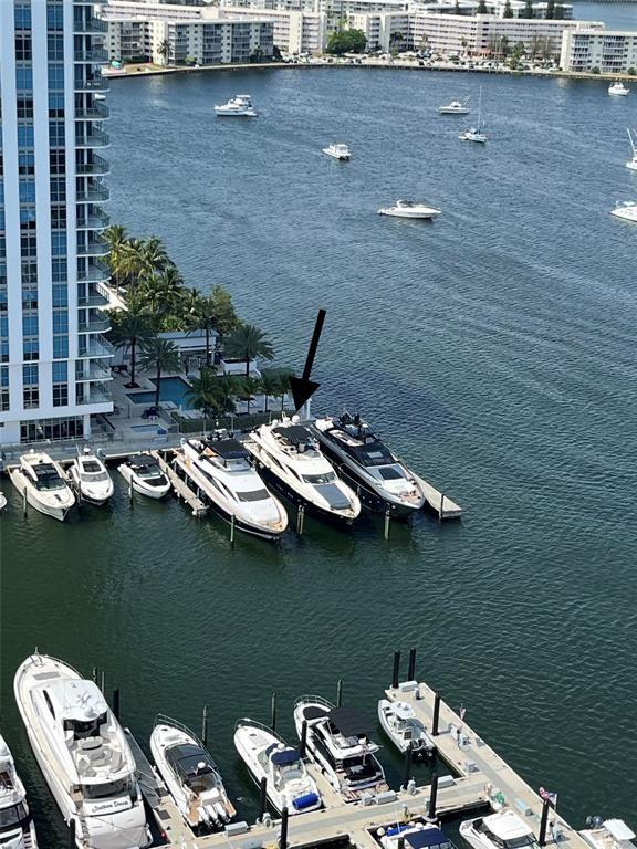 17111 Biscayne Boulevard North Miami Beach, FL 33160 - Photo 36 of 37 a view of a lake with lawn chairs
