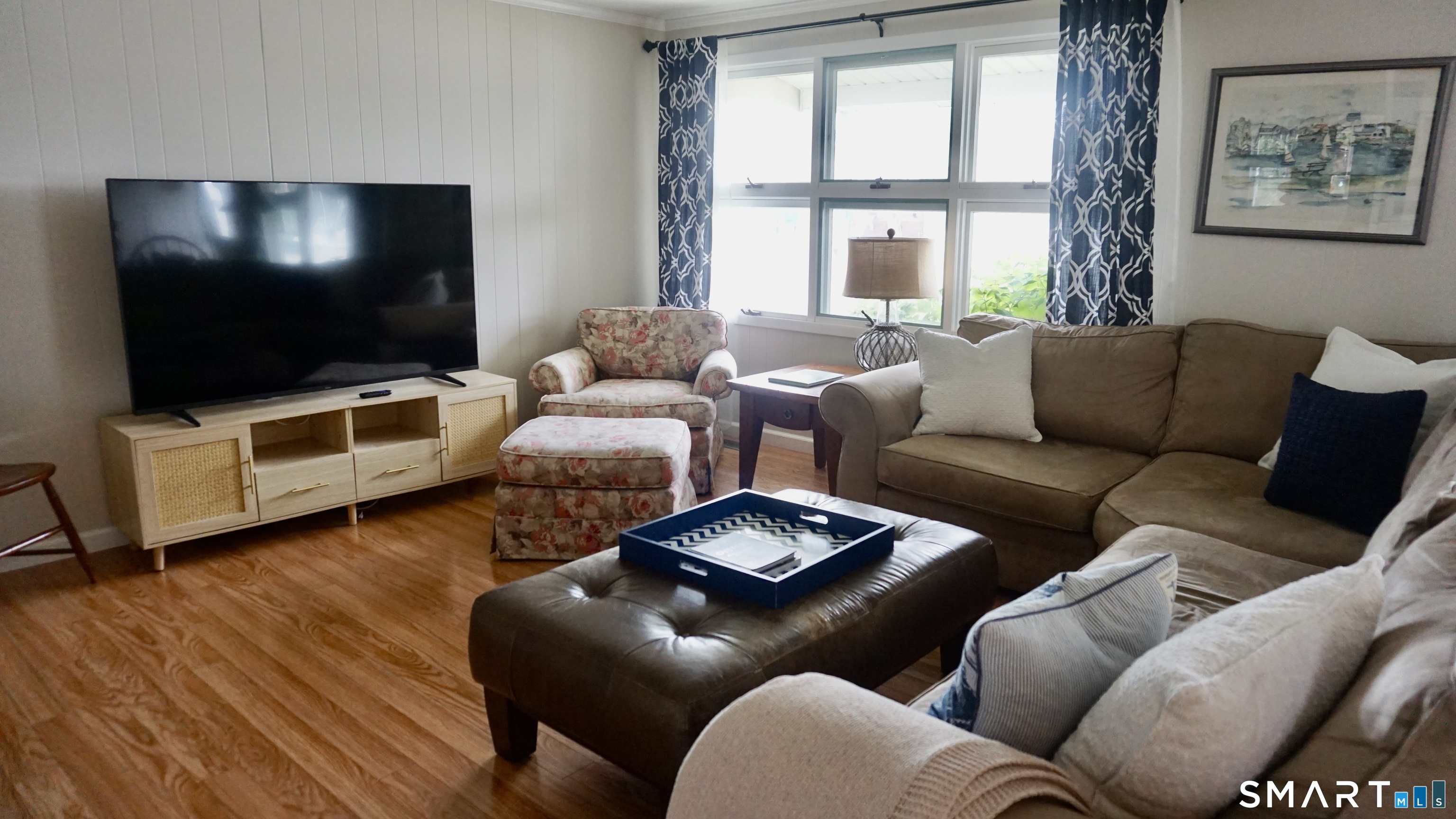 13 Pacific Street Groton, CT 06340 - Photo 12 of 31 a living room with furniture and a flat screen tv