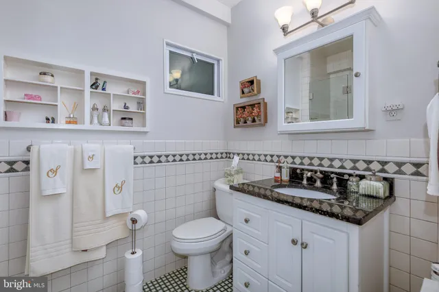 a picture of a wall and a sign on the wall