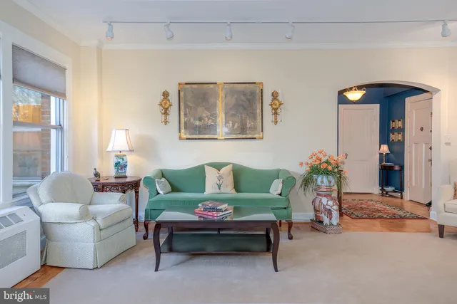 a living room with furniture and window