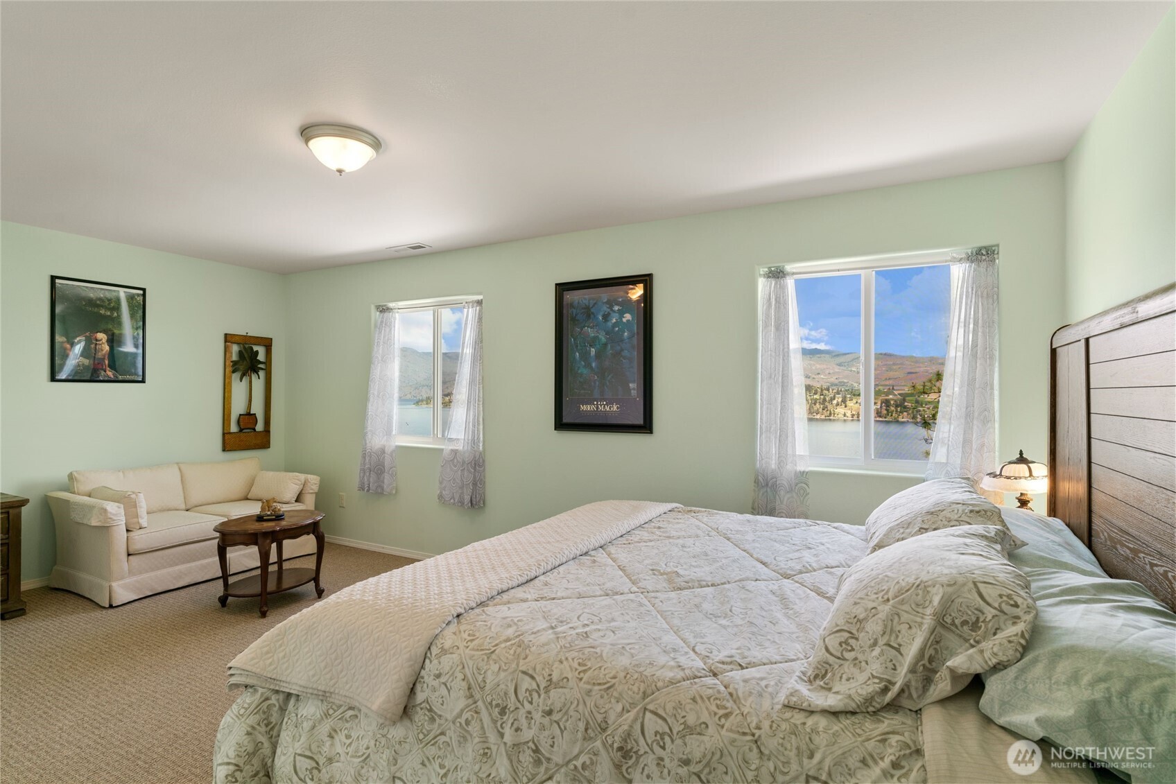 165 Granite Falls Road Chelan, WA 98816 - Photo 15 of 27 a bedroom with a bed and a couch