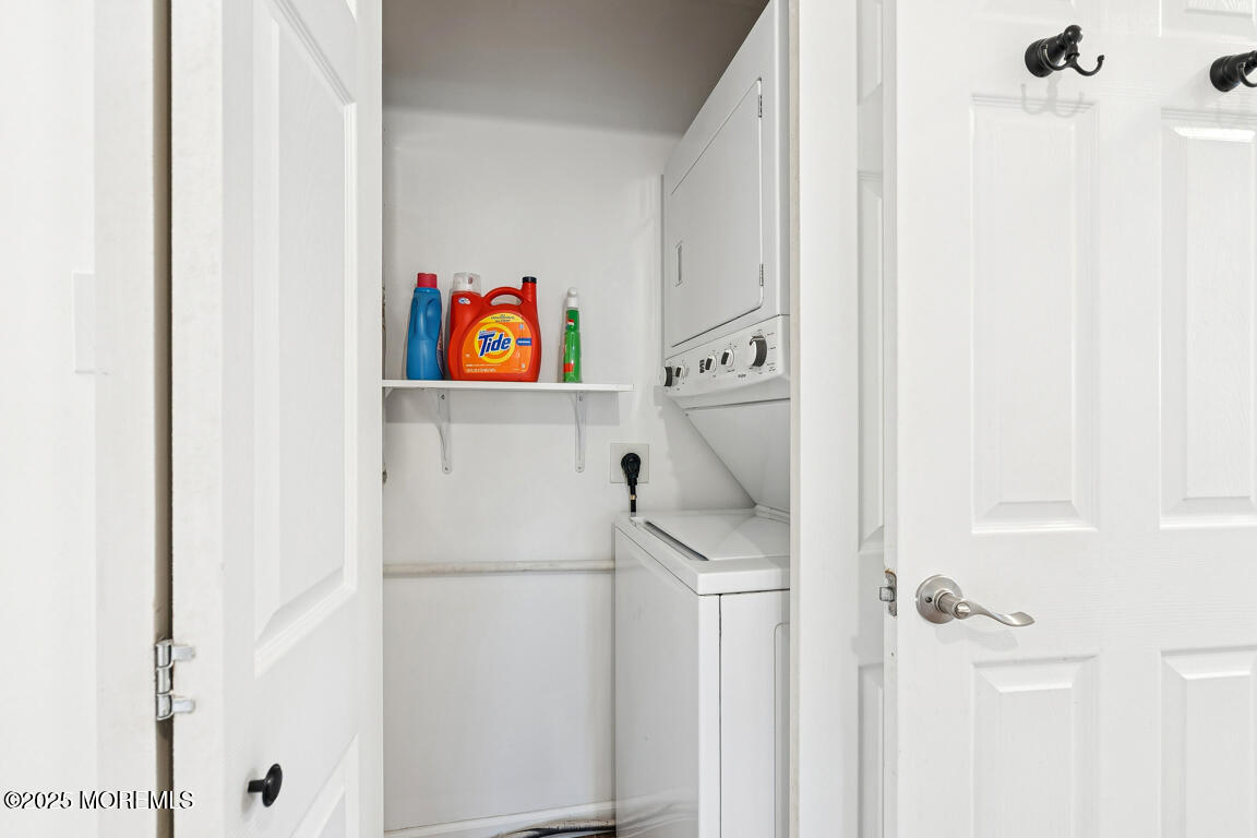 5 Phillips Road Brick, NJ 08724 - Photo 14 of 31 a white refrigerator freezer and a dishwasher with wooden floor