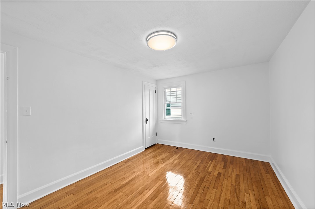 1409 Mayfield Ridge Road Mayfield Heights, OH 44124 - Photo 22 of 40 Bedroom with beautiful hardwood floors