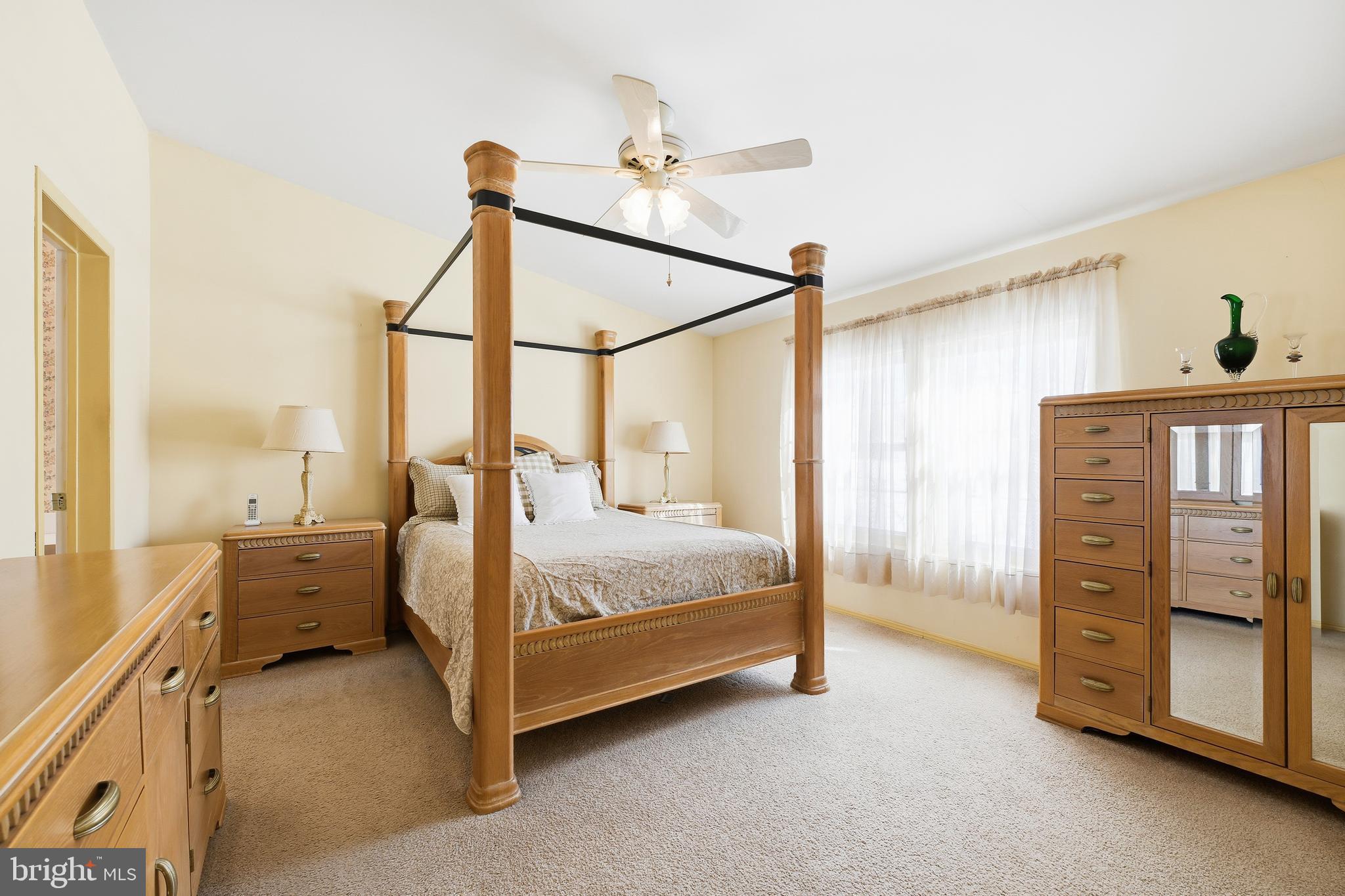 524 Butternut Court New Hope, PA 18938 - Photo 19 of 26 a bed room with a bed and a window