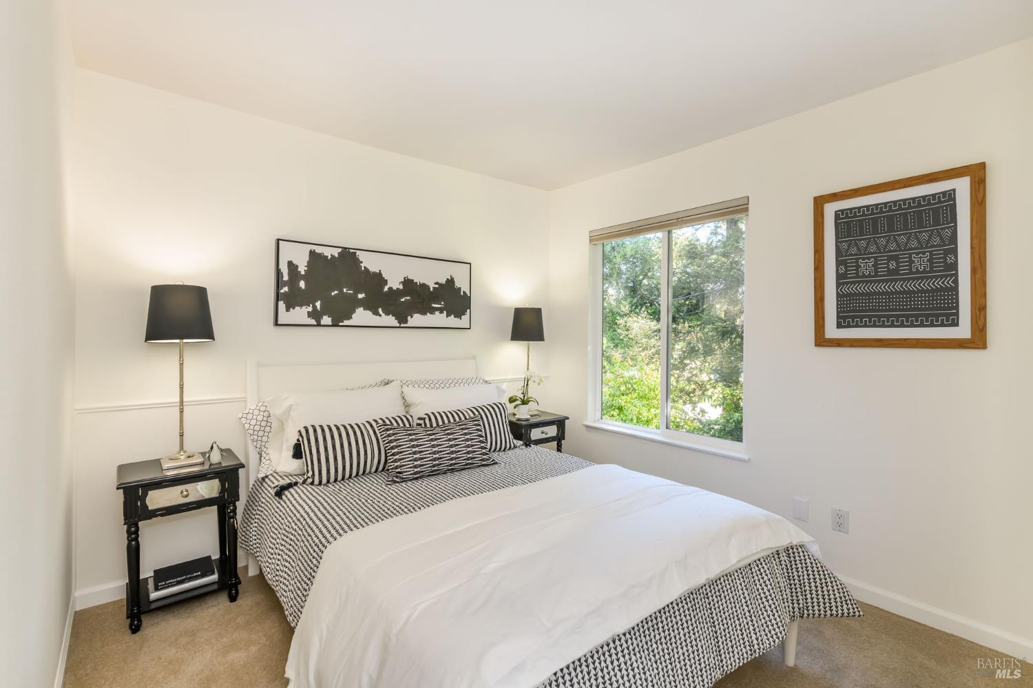 36 Schmidt Lane San Rafael, CA 94903 - Photo 24 of 31 a bedroom with a bed and a painting on the wall
