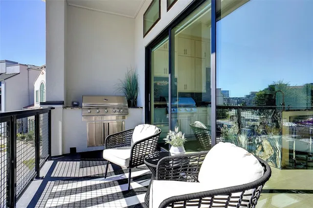 a bedroom with a bed and a night stand