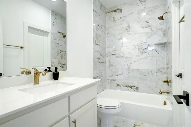 a view of an empty room with a fireplace