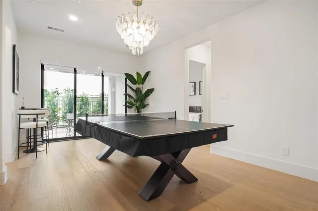 a bedroom with a bed and a night stand