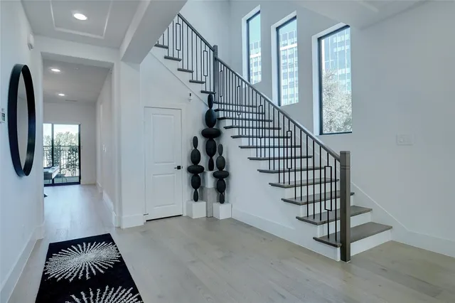 a work room with furniture and a potted plant