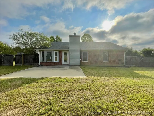 a view of a house with a garden