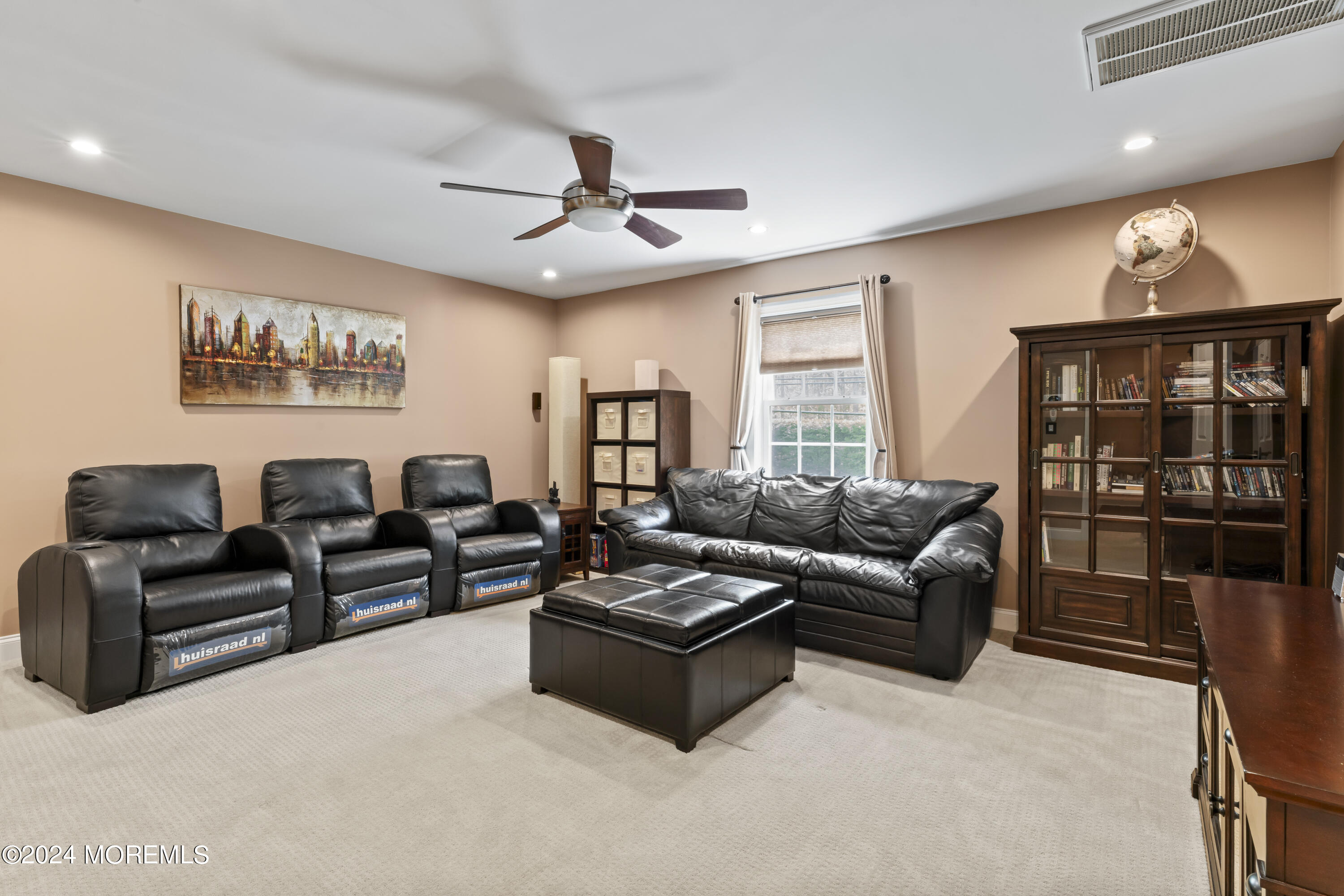 1588 West Front Street Lincroft, NJ 07738 - Photo 17 of 50 a living room with furniture a window and a flat screen tv