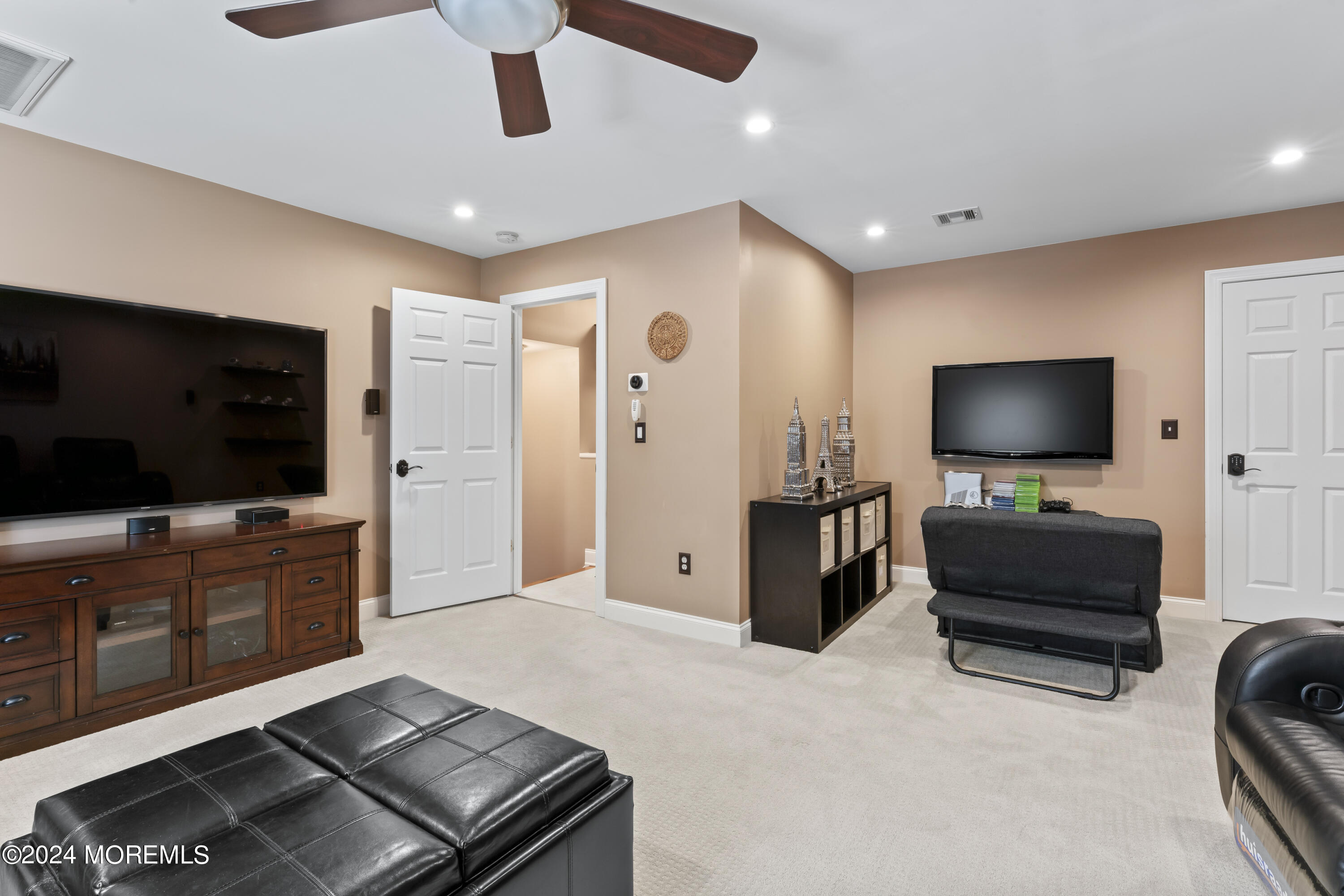 1588 West Front Street Lincroft, NJ 07738 - Photo 18 of 50 a living room with furniture and a flat screen tv