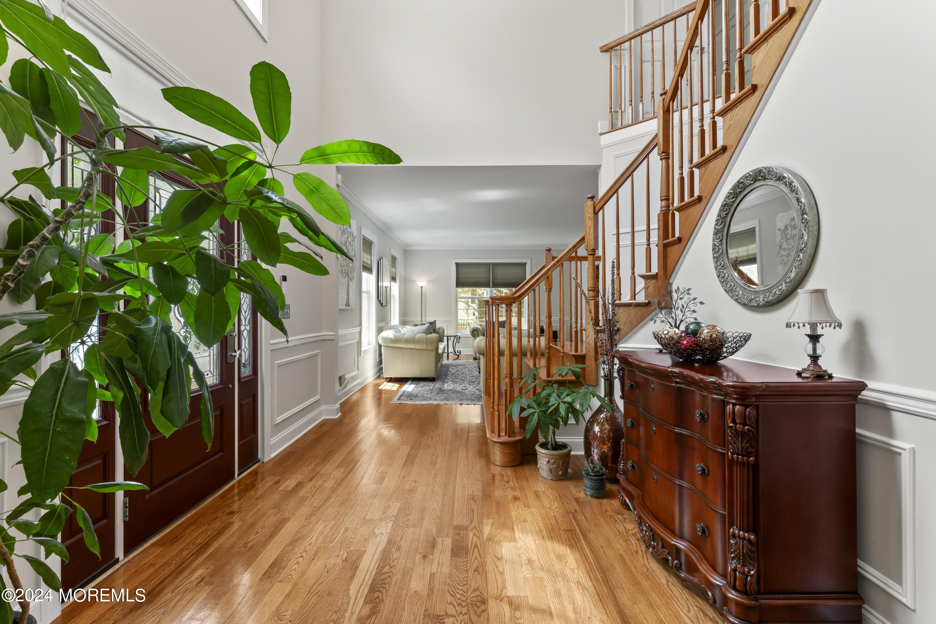 1588 West Front Street Lincroft, NJ 07738 - Photo 20 of 50 a living room with furniture and a potted plant