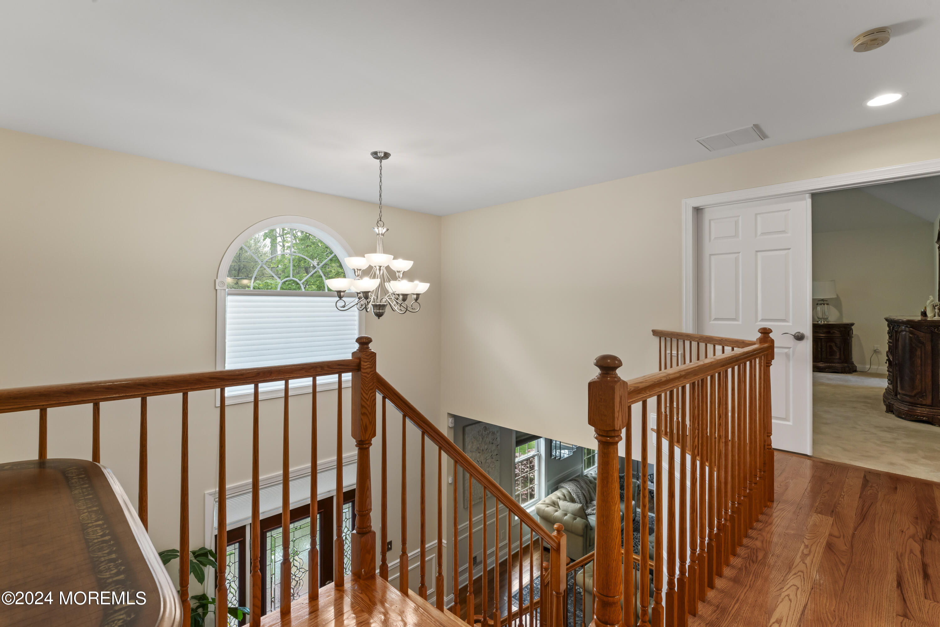1588 West Front Street Lincroft, NJ 07738 - Photo 21 of 50 a view of a hallway with stairs