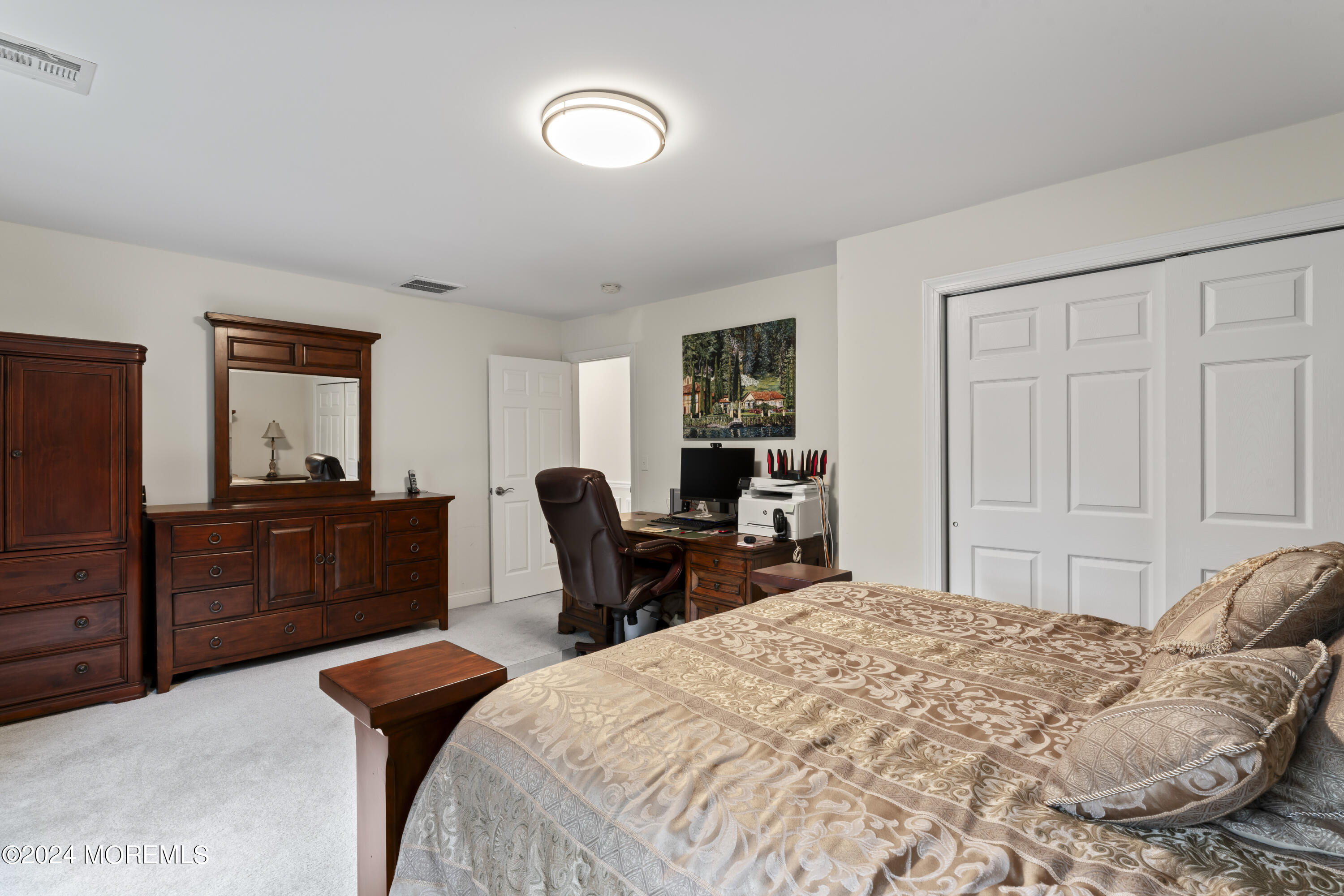 1588 West Front Street Lincroft, NJ 07738 - Photo 23 of 50 a bedroom with bed and a furniture