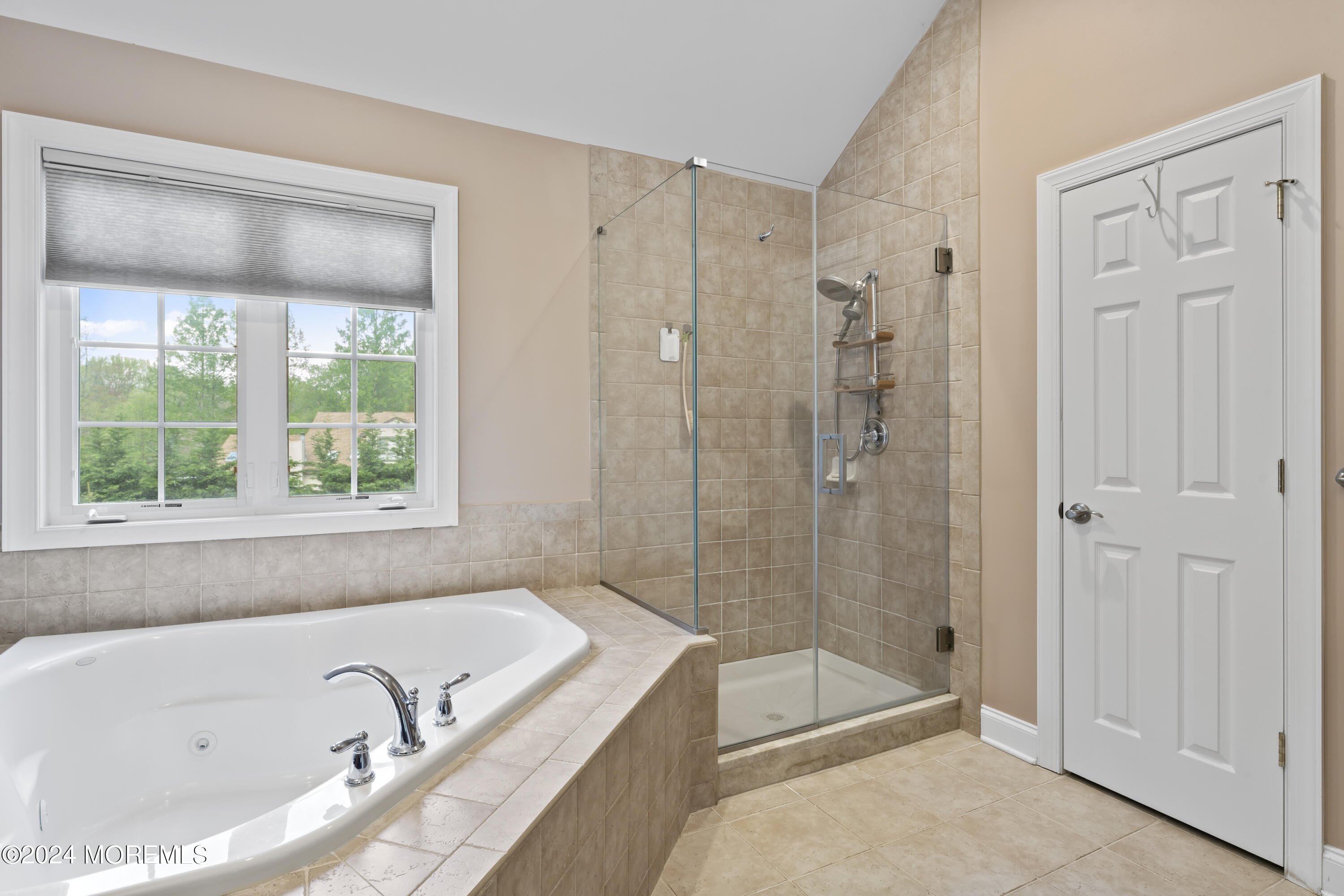 1588 West Front Street Lincroft, NJ 07738 - Photo 24 of 50 a bathroom with a bathtub and a shower