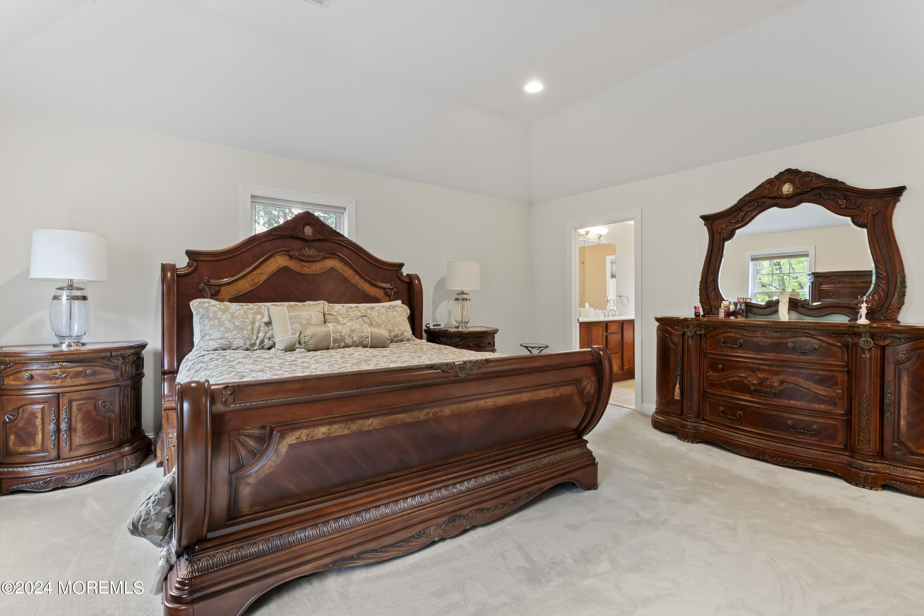 1588 West Front Street Lincroft, NJ 07738 - Photo 28 of 50 a bedroom with a bed and a dresser