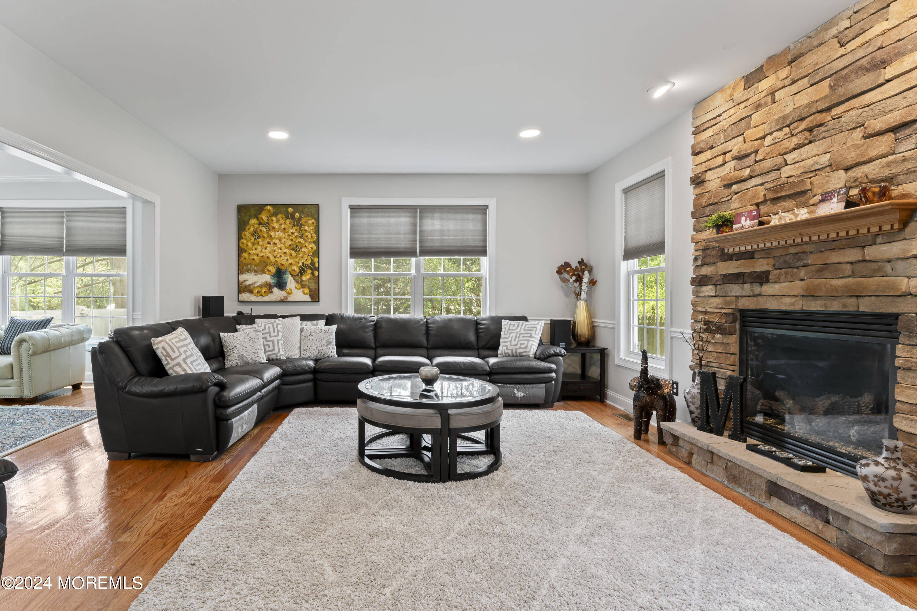 1588 West Front Street Lincroft, NJ 07738 - Photo 3 of 50 a living room with furniture and a fireplace