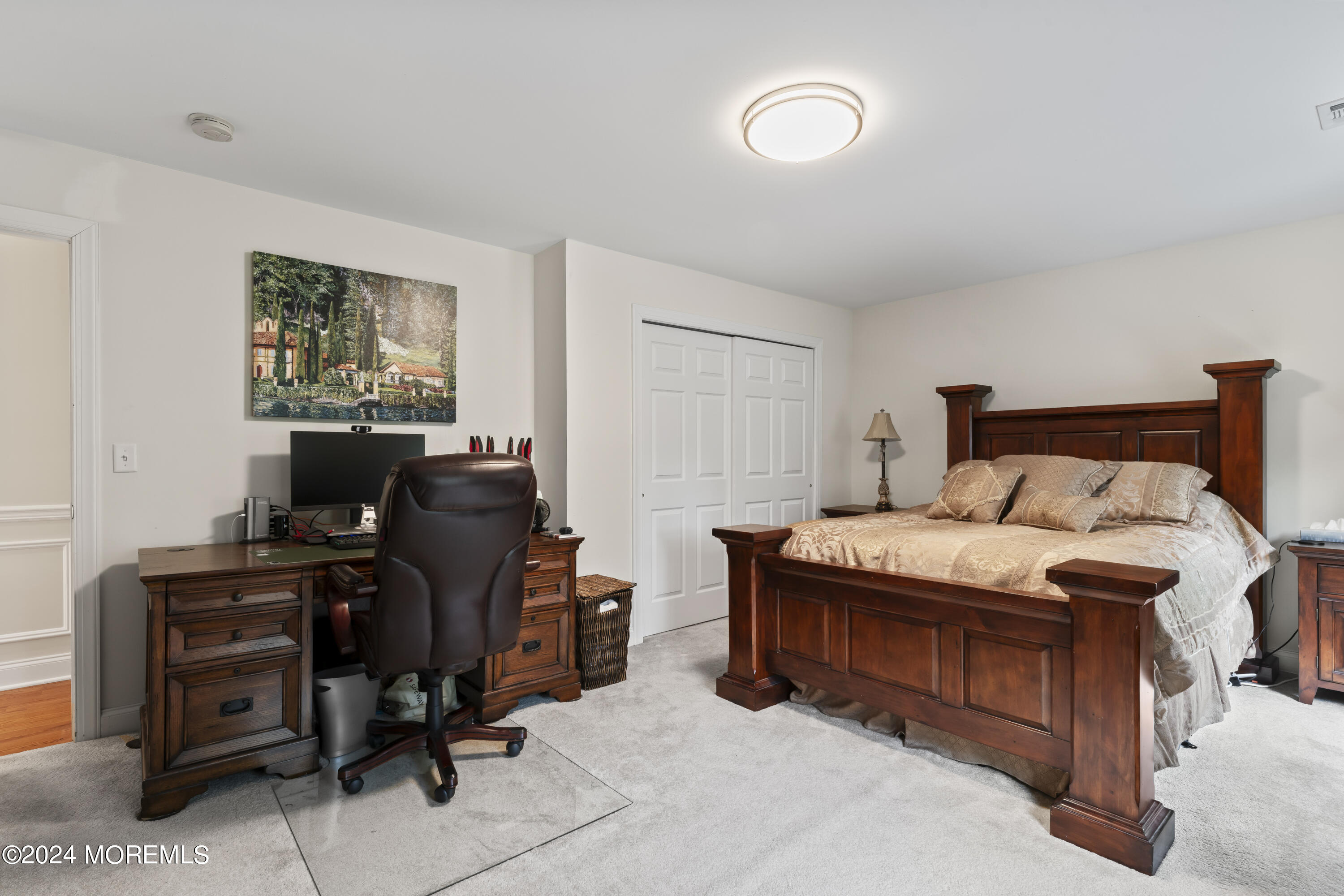 1588 West Front Street Lincroft, NJ 07738 - Photo 33 of 50 a bedroom with a bed and a desk