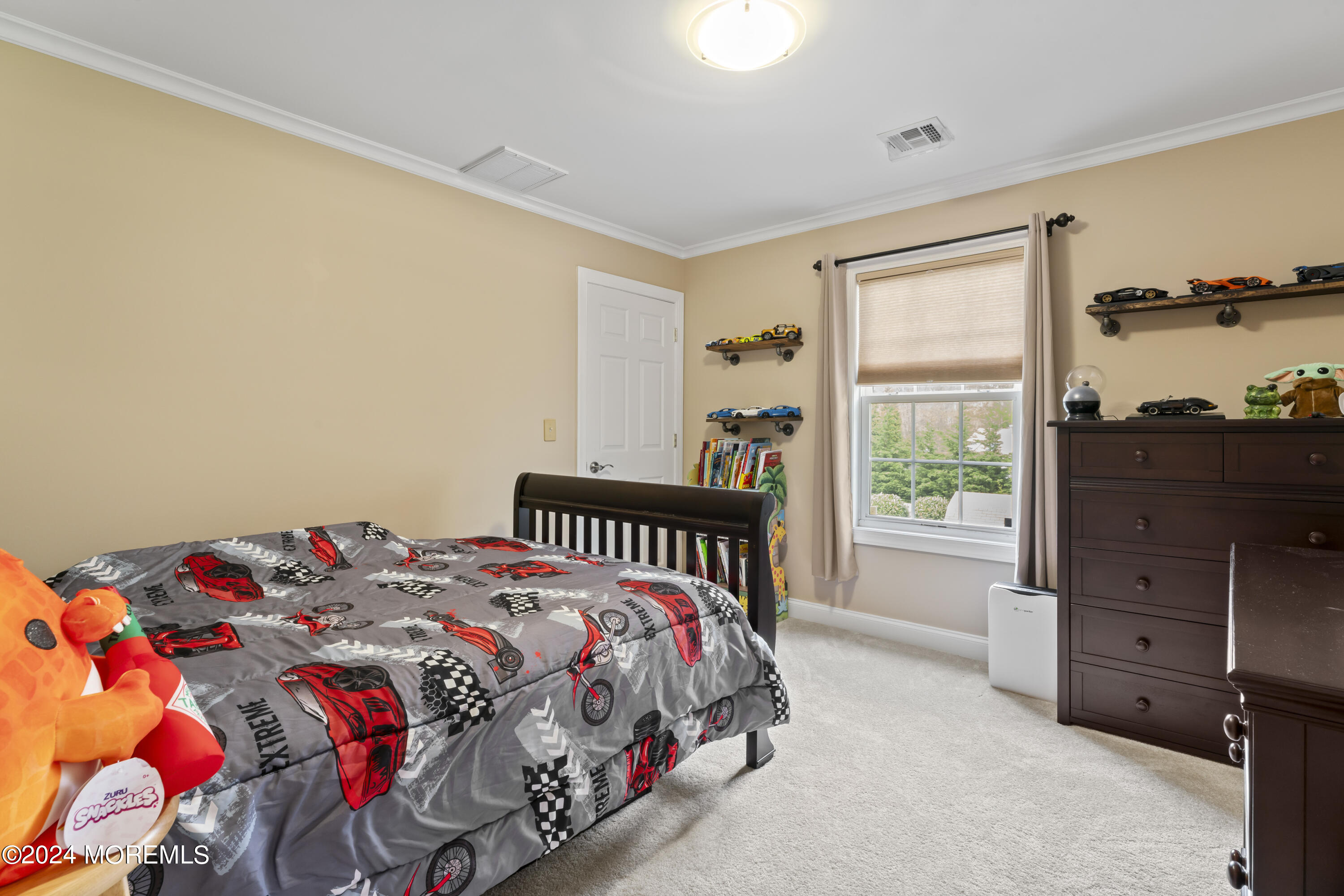 1588 West Front Street Lincroft, NJ 07738 - Photo 34 of 50 a bedroom with a bed and a window